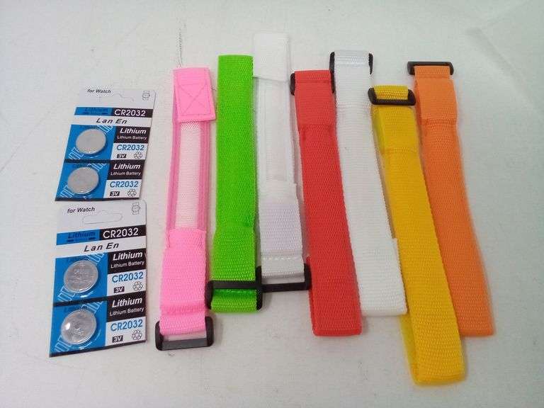Assortment Of 7 LED Light Up Wristbands With 4 Button Batteries