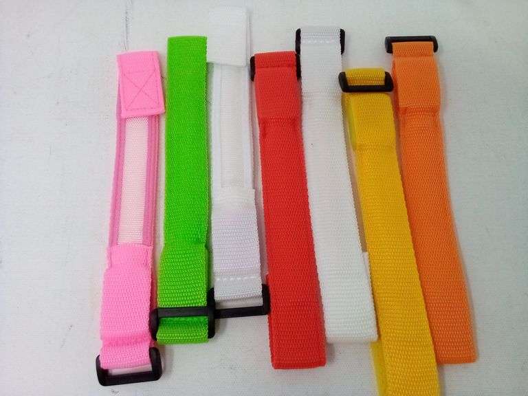 Assortment Of 7 LED Light Up Wristbands With 4 Button Batteries