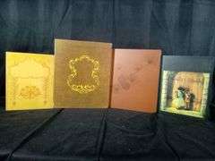 Assortment Of Hardcover Book Cases
