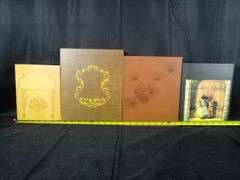 Assortment Of Hardcover Book Cases